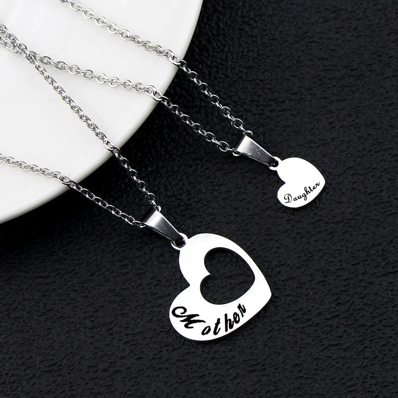 2PCS Gift for Mom Hollow Love Pendant Necklace™ — Radiant Symbols of Eternal Bond