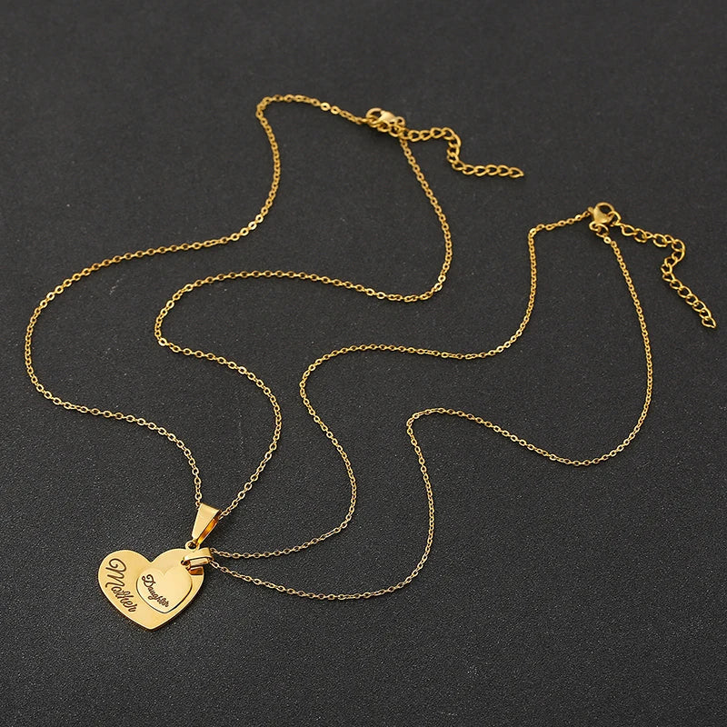 2PCS Gift for Mom Hollow Love Pendant Necklace™ — Radiant Symbols of Eternal Bond