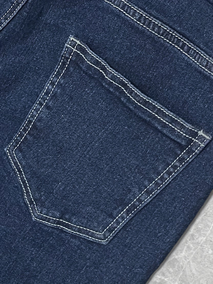 High-Waisted Flared Jeans – Medium Wash Denim with Leg-Lengthening Stitching