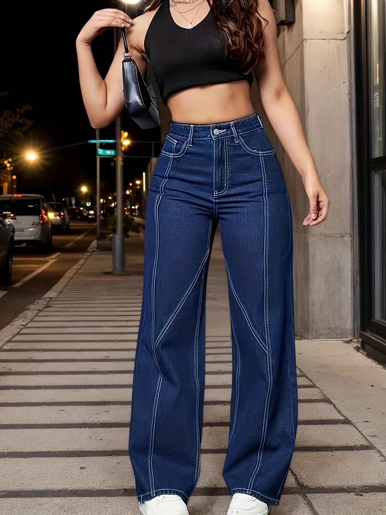 High-Waisted Flared Jeans – Medium Wash Denim with Leg-Lengthening Stitching